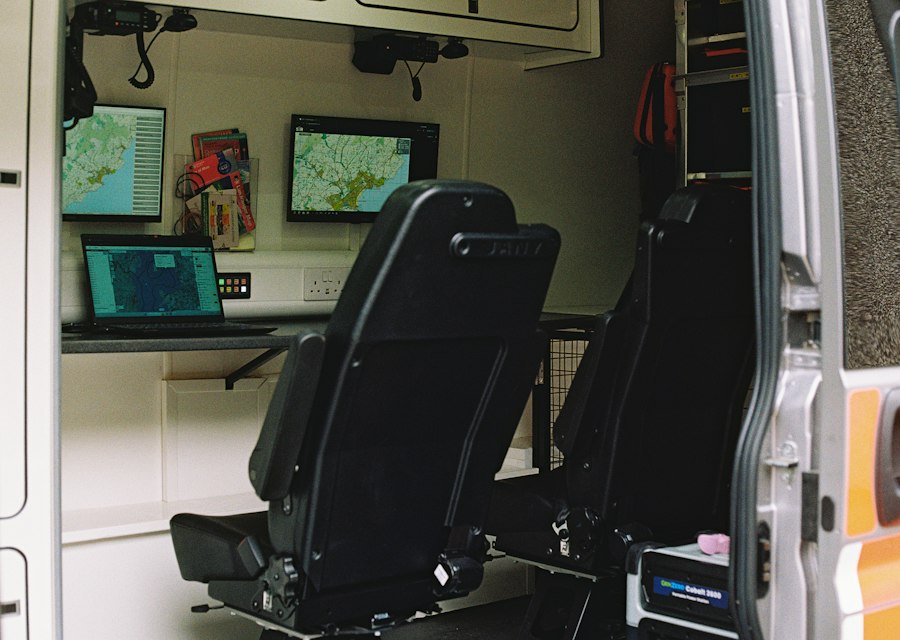 Dispatch workstation with multiple monitors inside a command vehicle